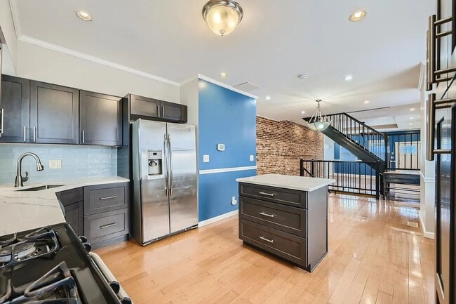 Building Photo - Charming 3 Bedroom/2.5 Bathroom Townhome in Patterson Park with Parking Pad!