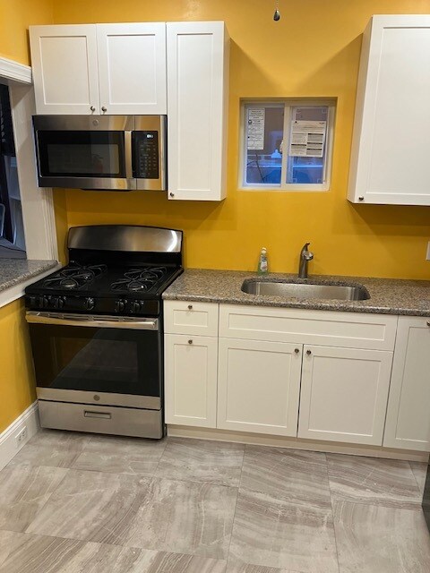 Building Photo - 6115 Lansdowne Ave