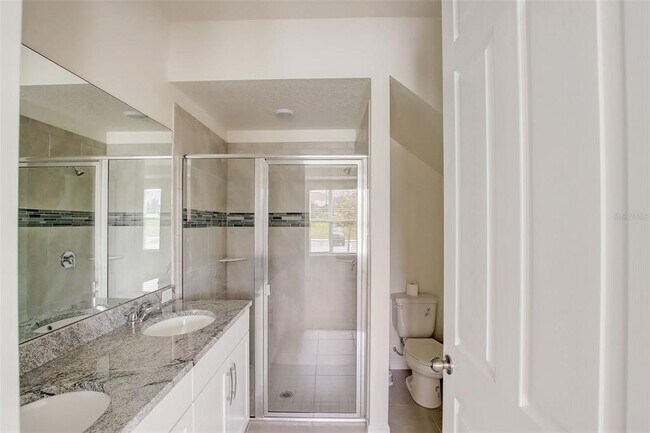 Building Photo - 1688 Tropical Palms Cir