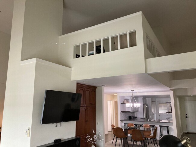 Building Photo - Beachside Furnished Retreat! Remodeled 2BD/2BA Condo Steps from the Sand!