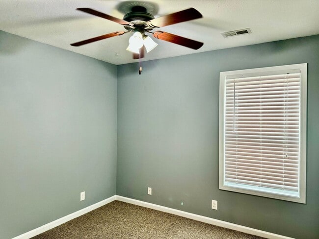 Building Photo - Large Open 4 Bedroom Home with Bonus! Tree Lined Backyard with Privacy Fence!