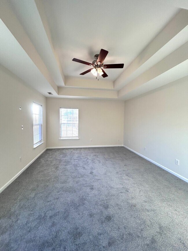 Building Photo - Stunning 4BR Home with amazing pond views!