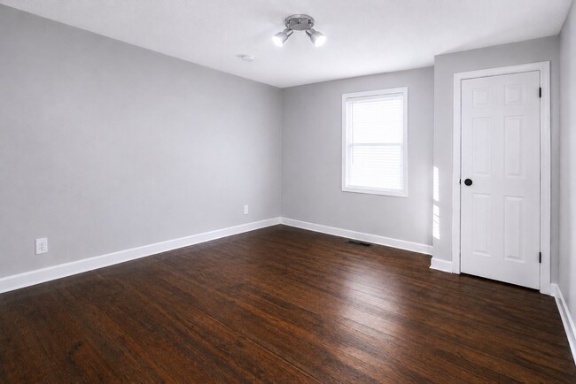 Building Photo - Updated Multi-Bedroom Home | Brand-New Deck | Circular Drive | Triad Premier Realty