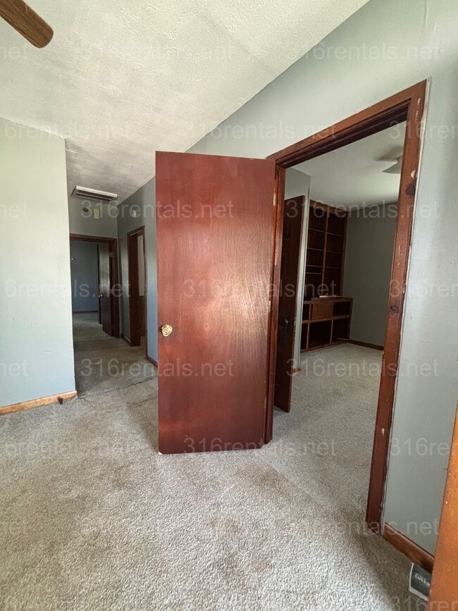 Building Photo - Two bed one bath fenced in yard house available now