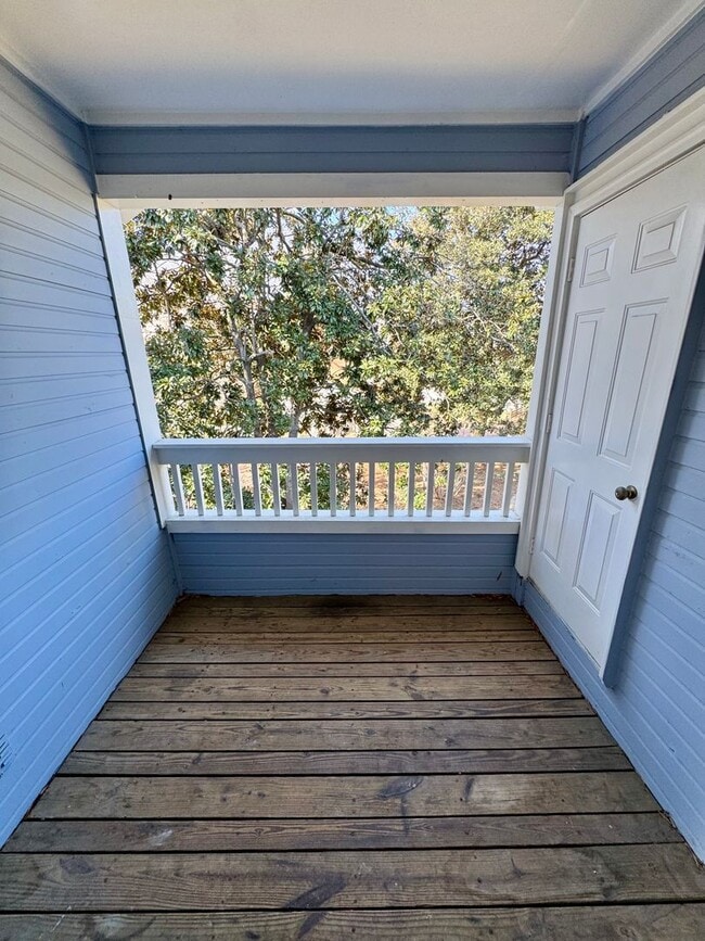 Building Photo - Top-Floor End Unit Condo at New Bern Place