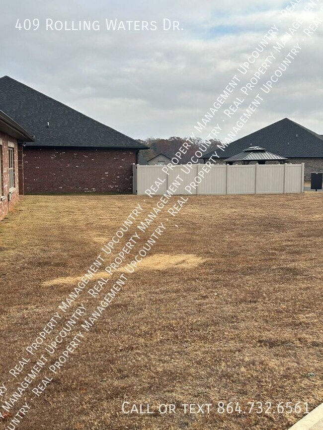 Building Photo - 409 Rolling Waters Dr