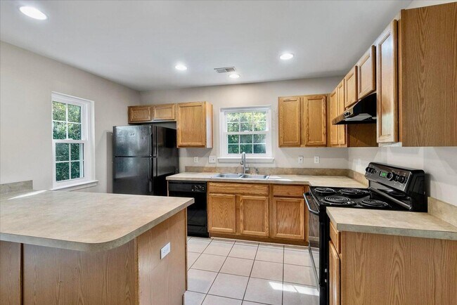 Building Photo - Bright, Spacious, and Ideally Located in t...