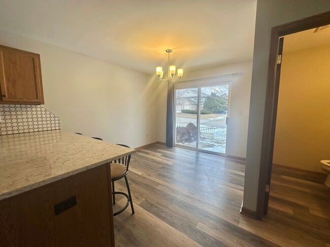 Building Photo - Charming Pewaukee Townhome with Modern Touches and Ample Space