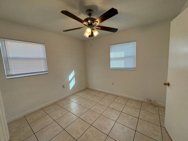 Building Photo - Charming Home with Fenced Back Yard