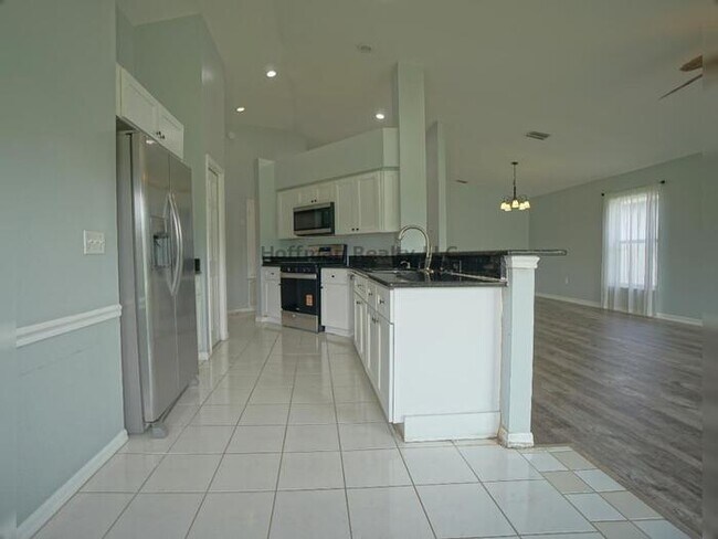 Building Photo - Charming 3 Bed, 2 Bath Home with Pond View in Sought-After Community