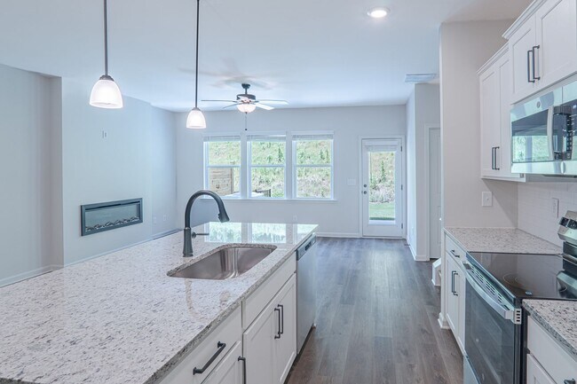 Building Photo - Never-Lived-In 3BR/3BA Home Featuring Modern Design & Premium Finishes