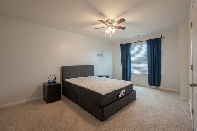 Building Photo - Partially furnished and now available!