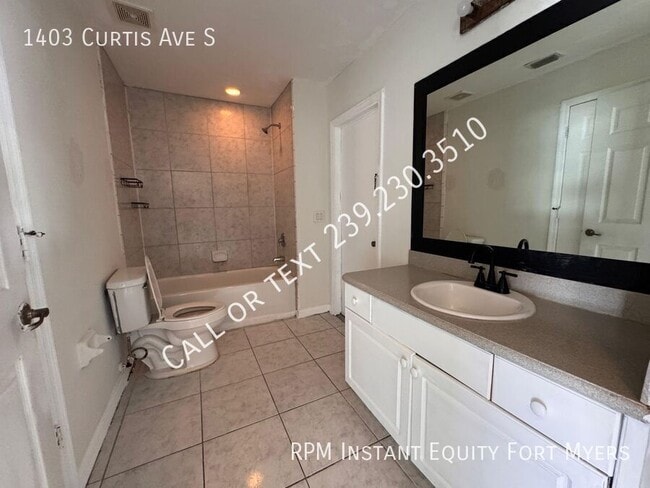 Building Photo - 1403 Curtis Ave S