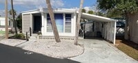 Building Photo - Beautiful fully furnished one bedroom, one bath manufactured home in a 55+ deed restricted gated ...