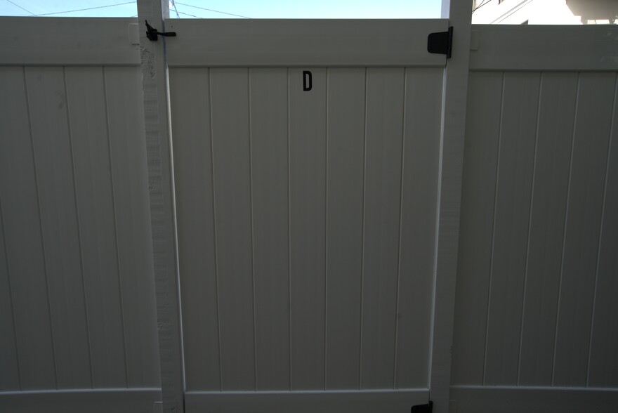 Fenced-off yard space exclusive to this unit - 1123 E Ocean Blvd