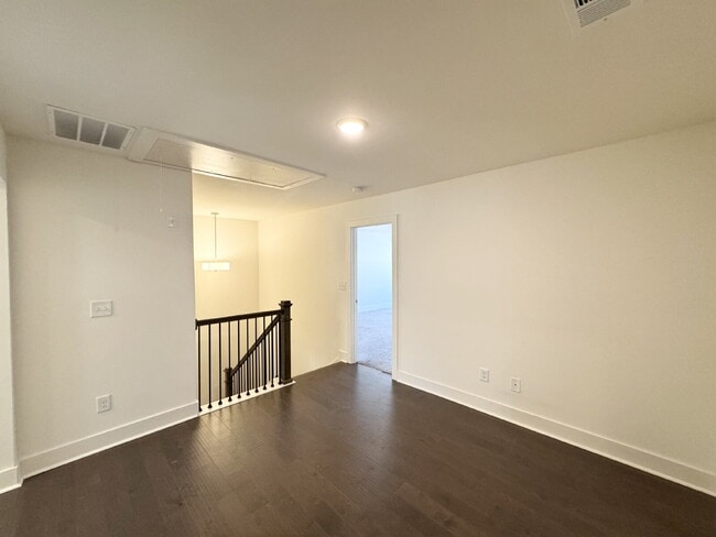 Building Photo - Stylish 3BR Townhome with Private Yard & T...