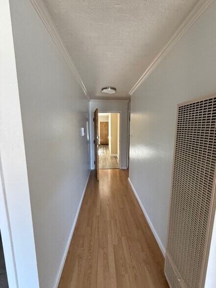 living room view to front door - 409 Kirkham St