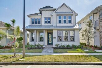 Building Photo - Gorgeous 4/3 Residence with a Private Back Lanai and a 3 Car Garage in the Delightful Laureate Pa...