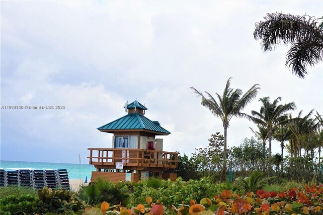 Building Photo - 15811 Collins Ave