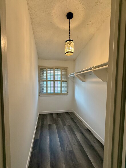 Primary bedroom with private bathroom and walk in closet - 3500 W Manchester Blvd