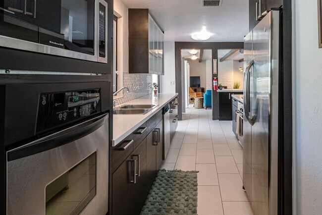 Building Photo - Luxury Mid-Century Retreat in the Heart of...