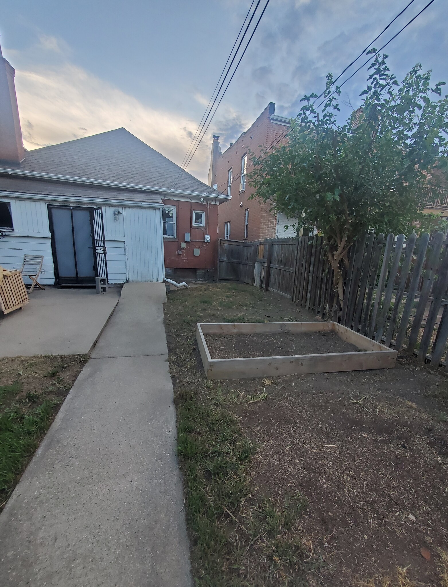 Spacious backyard, facing back of house. - 2844 N Marion St