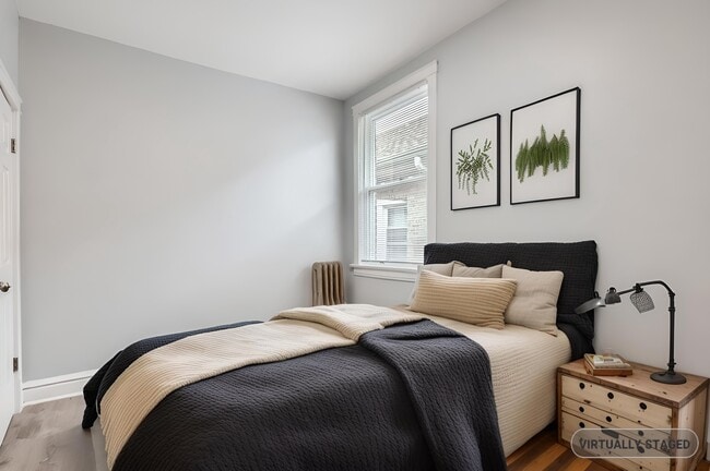 Building Photo - 7449 S Vernon Ave