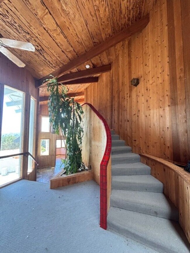 Building Photo - Stunning Hilltop Retreat with Panoramic Oc...