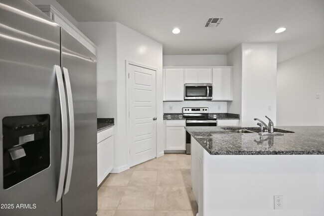 Building Photo - 38180 W Amalfi Ave