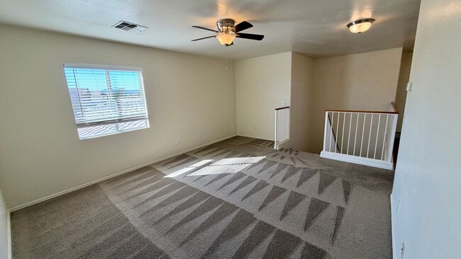 Building Photo - Two Story Home with NEW tile and a large backyard!