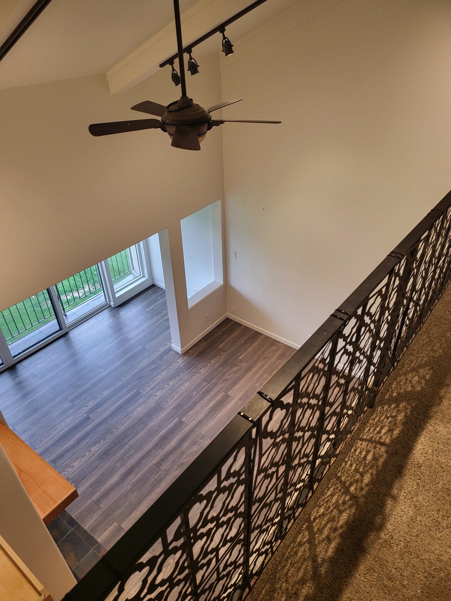 looking down into living room from den - 301 Iberian Way