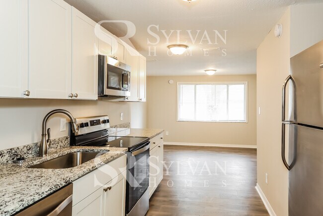 Building Photo - The living is easy in this 3 bedroom, 2 bathroom home!