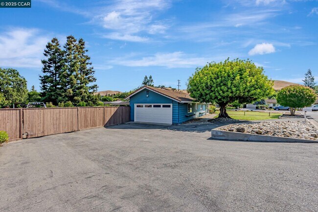 Building Photo - 5891 Caulfield Dr