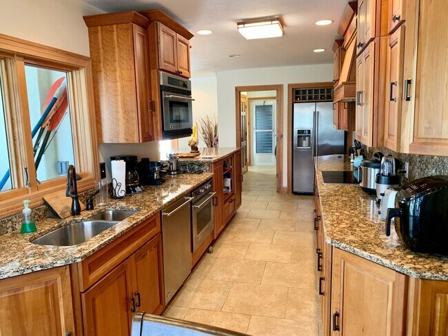 Building Photo - AVAILABLE 2027 SEASON! ! PGI HEATED POOL, WATERFRONT, BOAT LIFT