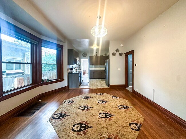 Building Photo - A home where old-world charm meets modern sophistication!