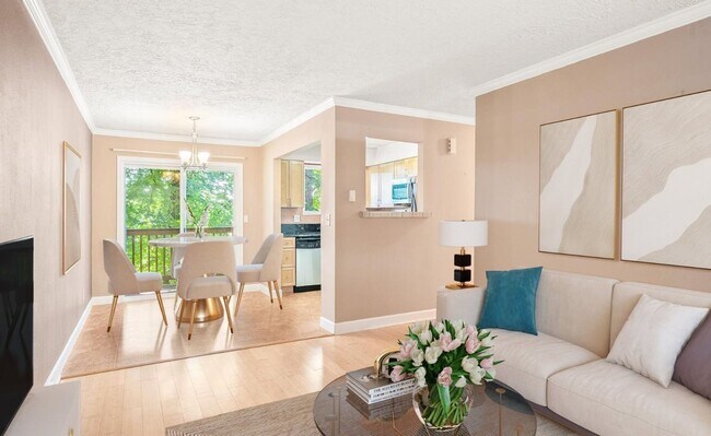 Building Photo - Spacious 2-Bedroom Condo with Forest Views, Private Balcony, In-Unit Laundry & Community Amenitie...