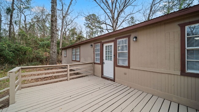 Building Photo - Rural, wooded living in this 4 bedroom, 2 full bath home on just under a quarter of an acre. NEW ...