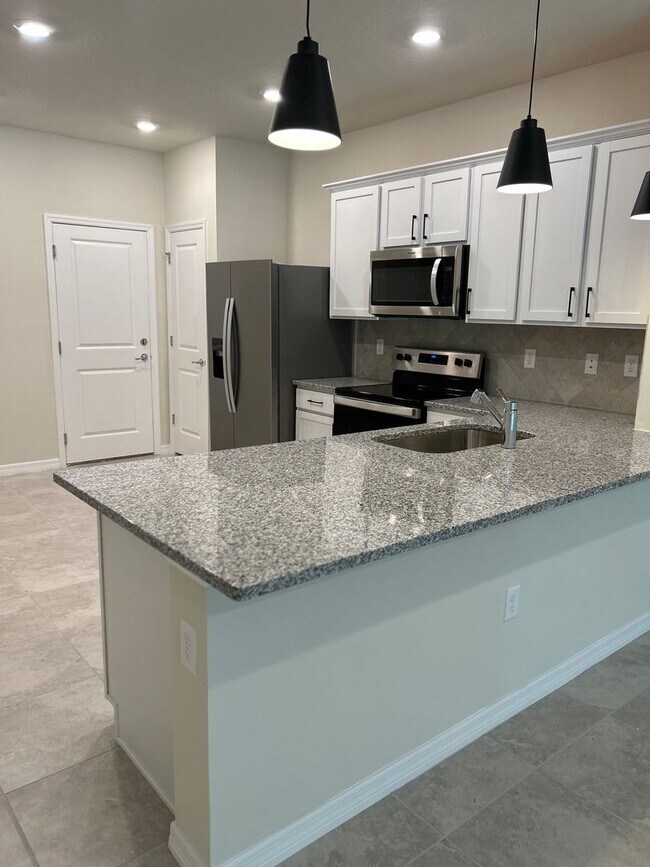 Building Photo - Move In ASAP!! - Brand New 3 bedroom 2.5 bath Townhouse for rent in Kissimmee, FL.