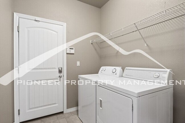 Building Photo - 6758 Black Saddle Dr