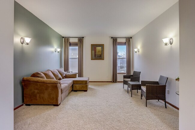 Building Photo - Grand 5 bed 4.5 bath Maple Grove Home w/ 3-Car Garage! Fully Furnished