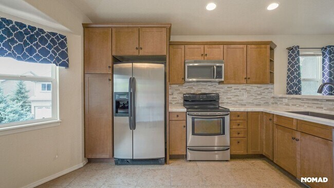 Building Photo - Charming 3BR Townhome in Colorado Springs