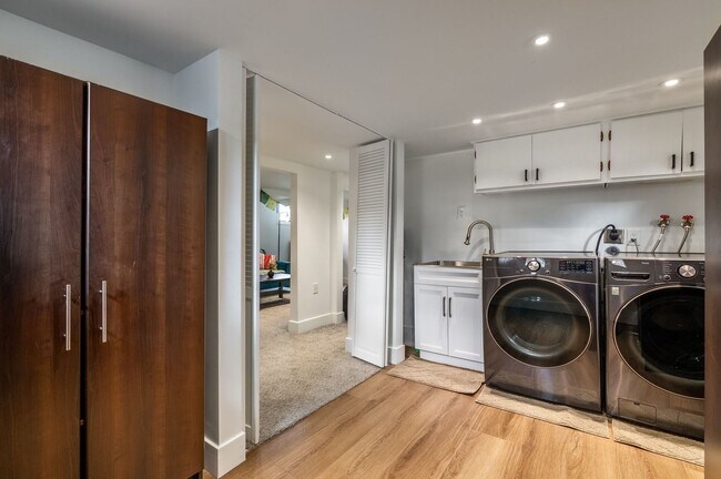 Building Photo - Charming 1935 Tudor in 15th & 15th – Renovated with Modern Luxury