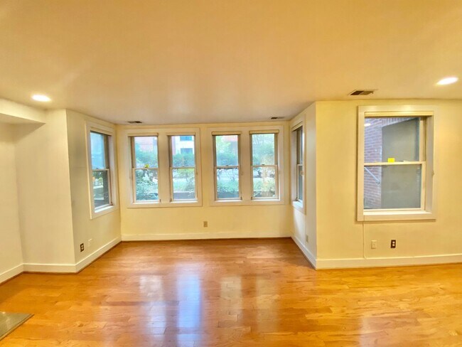 Building Photo - SAVE OVER $200!* Dupont Circle 1 Bedroom Charmer with Patio, Fireplace, Central Air, Washer/Dryer!