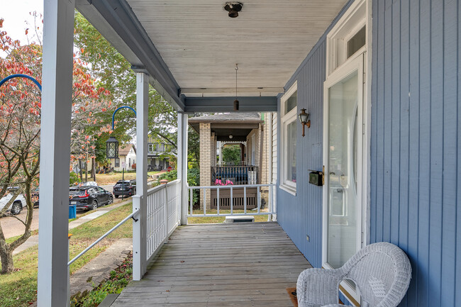 Enjoy the large, covered front porch. - 713 Clinton Pl