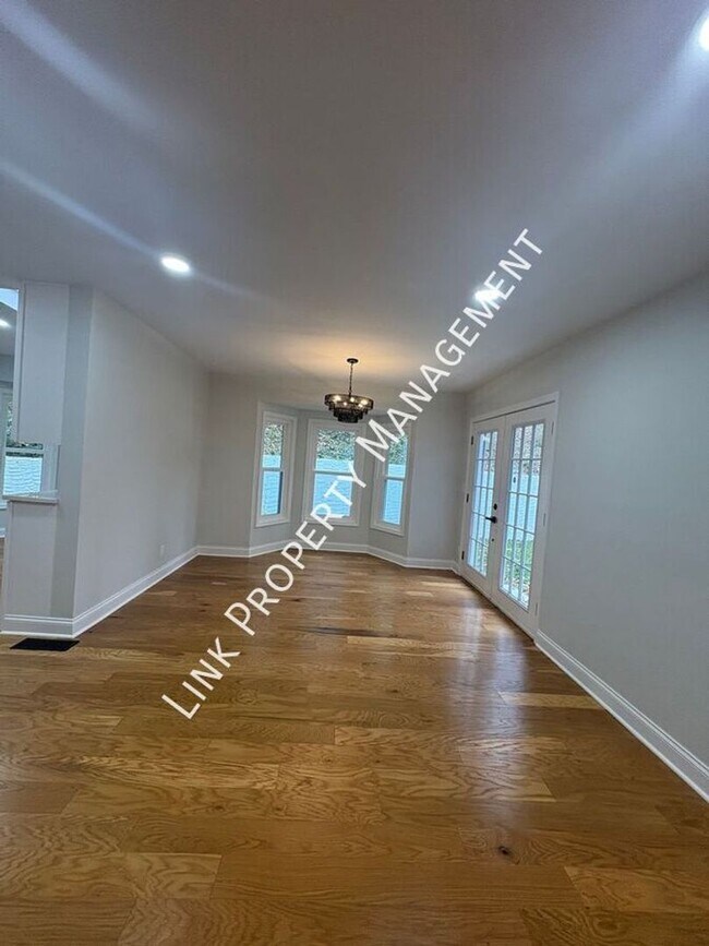 Building Photo - JUST REDUCE!  Sophisticated Tri-Level Home in Stuart Heights — Modern Comfort & Timeless Charming...