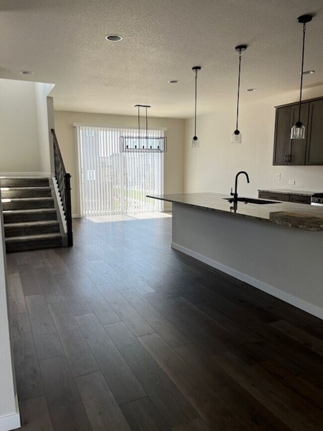 Building Photo - MODERN THREE STORY TOWNHOME WITH 2 CAR GAR...