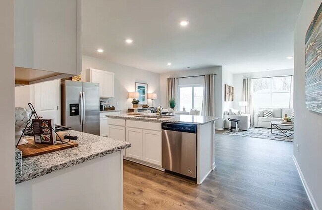 Building Photo - Brand New Construction - 4 bedroom 2 full ...