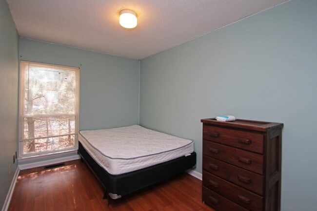 Building Photo - "Rent a room in this 4-Bedroom Furnished T...