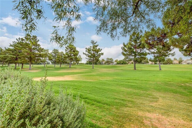 Building Photo - Amazing condominium in gated upscale neigh...