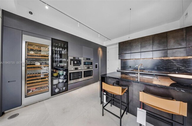 Building Photo - 9705 Collins Ave